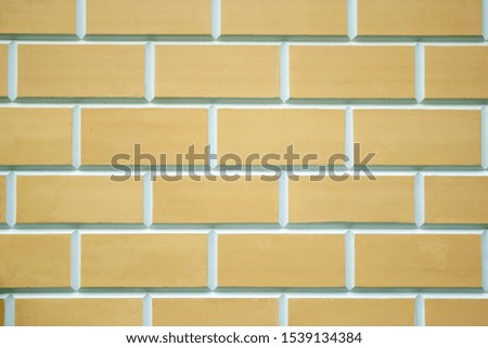 Beige bricks wall texture. New clean beige bricks background
