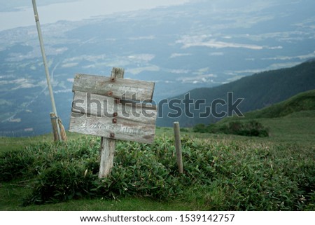 Signpost top of the mountain. Translation : Horai mountain, kojorogaike pond, summit station. 