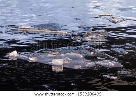 Pretty great ice floes in dark water