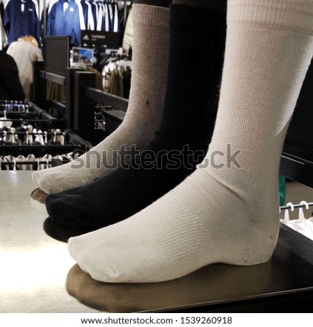 Macro photo mannequin socks. Stock photo man socks in store