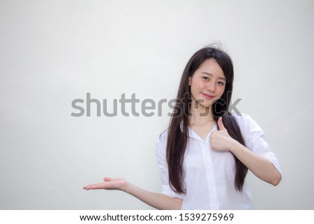 Portrait of thai adult working women white shirt show hand