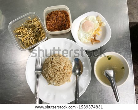 myanmar breakfast lifestyle , fried rice with soup and egg