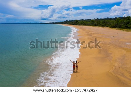 tropical beach in Central / South America, Bocas del torro, Isla Colon. with couple model