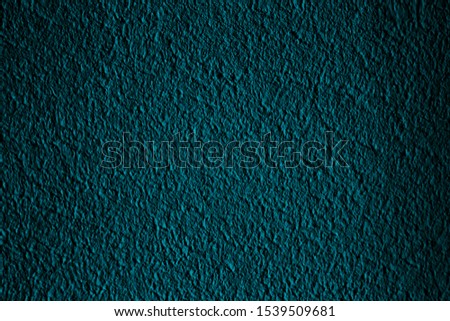 Petrol colored rough background with textures of different shades of petrol or teal.