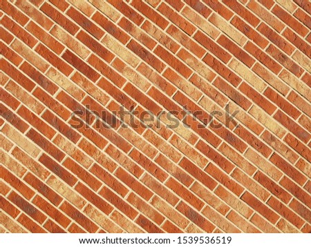 Old red brick wall texture background, orange stone block wall texture, rough and grunge surface as used for backdrop, wallpaper and graphic web design. Interior home new pattern designed structure

