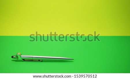 Stylus Pen isolated in the Green Background