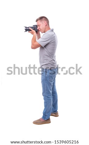 Photographer with the camera isolated on white background.