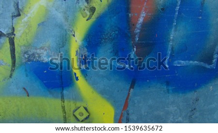 wet and metal wall painted with different colors