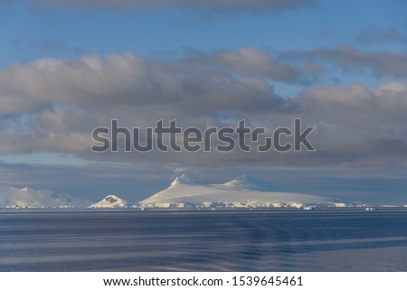  Antarctic landscape with glacier and mountains 