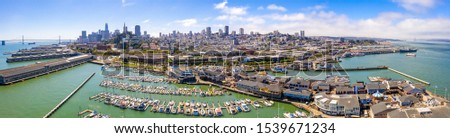 Aerial view of the San Francisco downtown by the San Francisco bay and Pier 39. Royalty-Free Stock Photo #1539671234