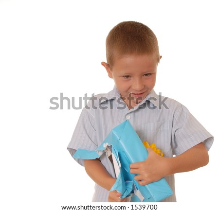 Boy opening a wrapped gift