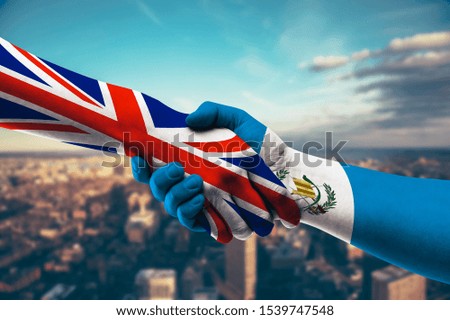 Shaking hands UK and Guatemala