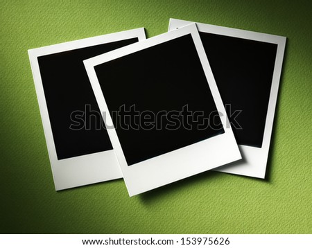 Photo frame on wood background