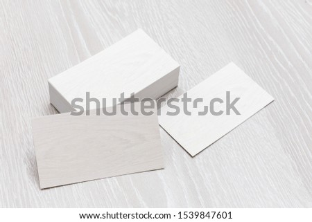 Business cards blank mockup - template on wood background