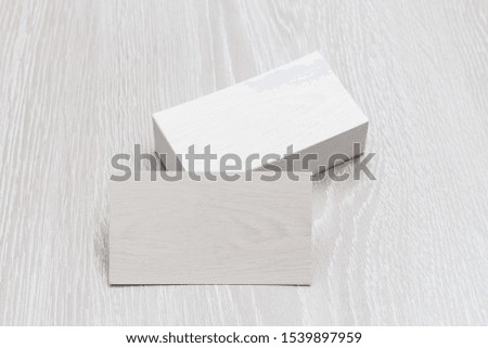 Business cards blank mockup - template on wood background