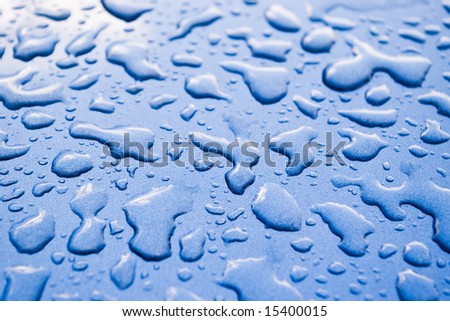water drops on blue with shallow depth of field