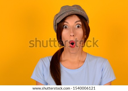 surprised woman on an isolated background emotions advertising space free