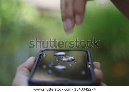 Water drops down the phone