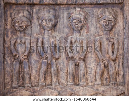 African traditional vintage  art, carved  tribal statues, mass produced to have a vintage look