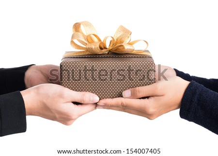 Cropped image of a couple holding an autumn present isolated on white