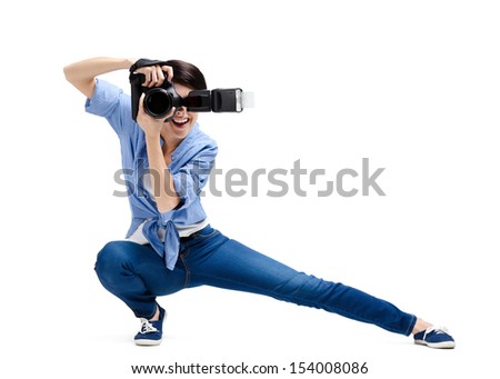 Lady-photographer takes snaps, isolated on white