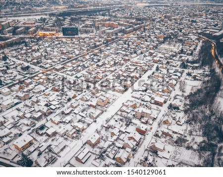 City after heavy snow. Kaunas, Lithuania. Drone aerial view