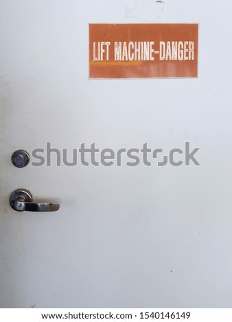 Machinery room entry with the danger sign