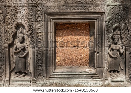 Apsara carvings status on the wall of Angkor temple, world heritage,  Siemreap, Cambodia