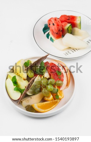 Sliced assorted fruits , healthy dessert– stock image