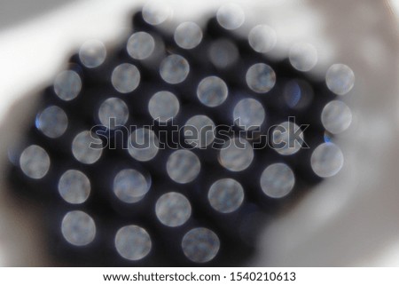 Background of defocused bokeh lights different colors.  Can be used as background, photophone.