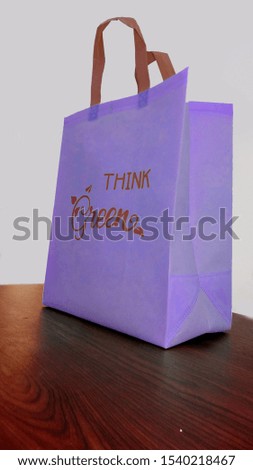 Non Woven Eco Friendly Think Green Bag on Table