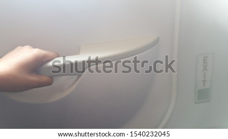 Emergency door exit on the airplane