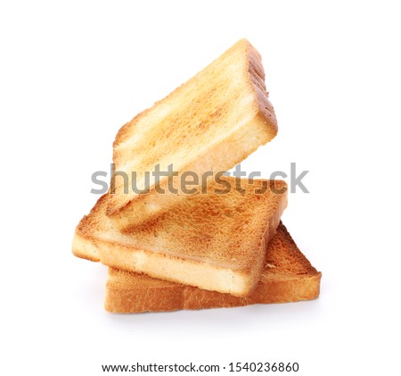Slices of toasted bread isolated on white Royalty-Free Stock Photo #1540236860