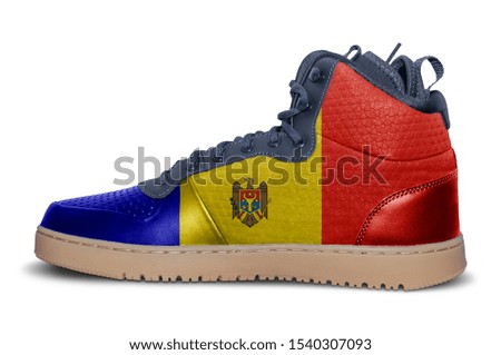 Fashion rubber snickers with flag of Moldova isolated on white background