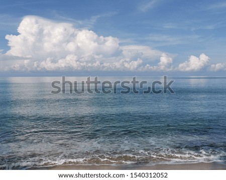 Beautiful beach on blue and white sky cloud background