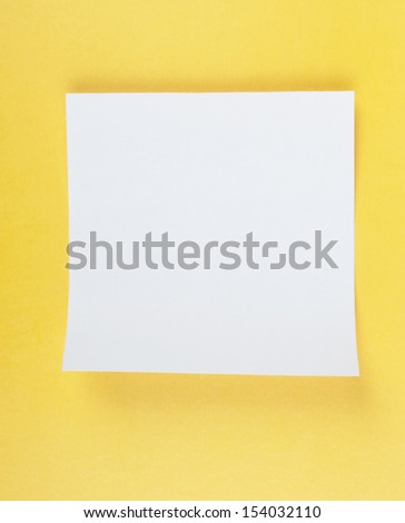 white note papers on yellow background