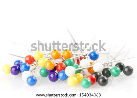 Sewing needles on a white background