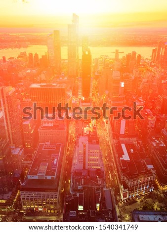 New york city at sunset with hudson river, aerial view