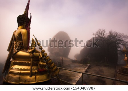 The Buddha image is located on the top of Khitchakut mountain. Chanthaburi Province, Thailand