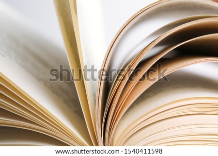 Closeup view of old open hardcover book