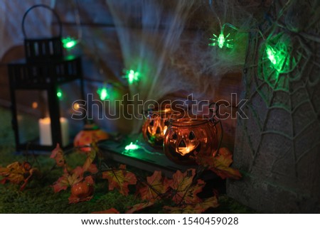 Halloween background, pumpkins and lanterns
