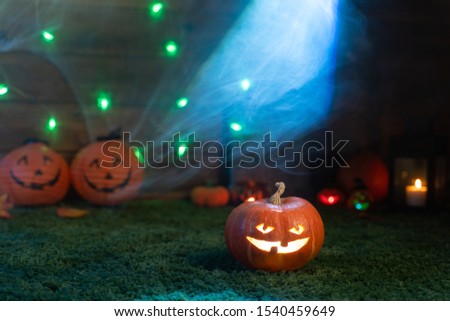 Halloween background, pumpkins and lanterns