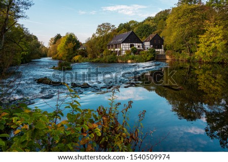Half-timbered houses on the river bank, Viewpoint Wipperkotten Royalty-Free Stock Photo #1540509974