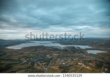 Aeriel look of a town and a lake