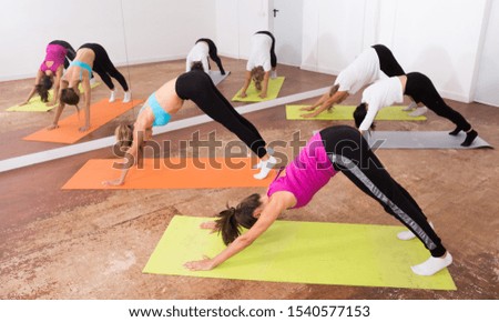 Group yoga classes in a fitness club