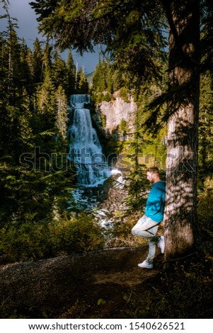 young men at Alexand falls in British Colombia Canada waterfalls Whistler