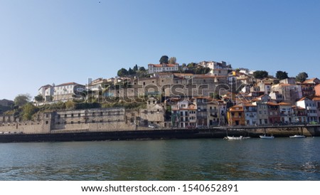 landscape of Vila Nova de Gaia from the Douro river in Porto Portugal