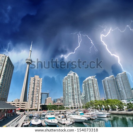 Toronto. Beautiful view of city buildings from the Pier with storm.