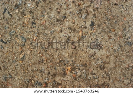 Yellow cobblestone gravel stones boulders pebbles texture background close-up. Material for repair and road construction Royalty-Free Stock Photo #1540763246