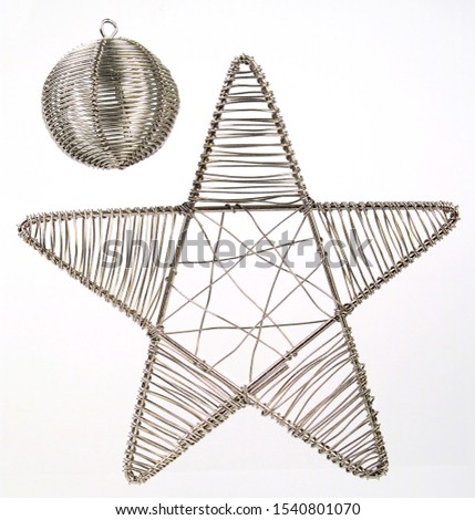 A pic of a silver wired ball and star Christmas tree decorations